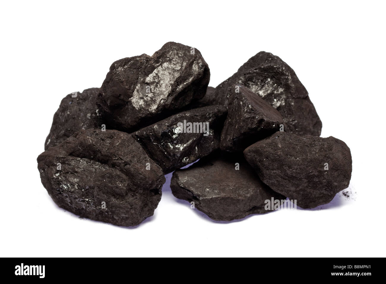 Heap of coal on white cutout Stock Photo