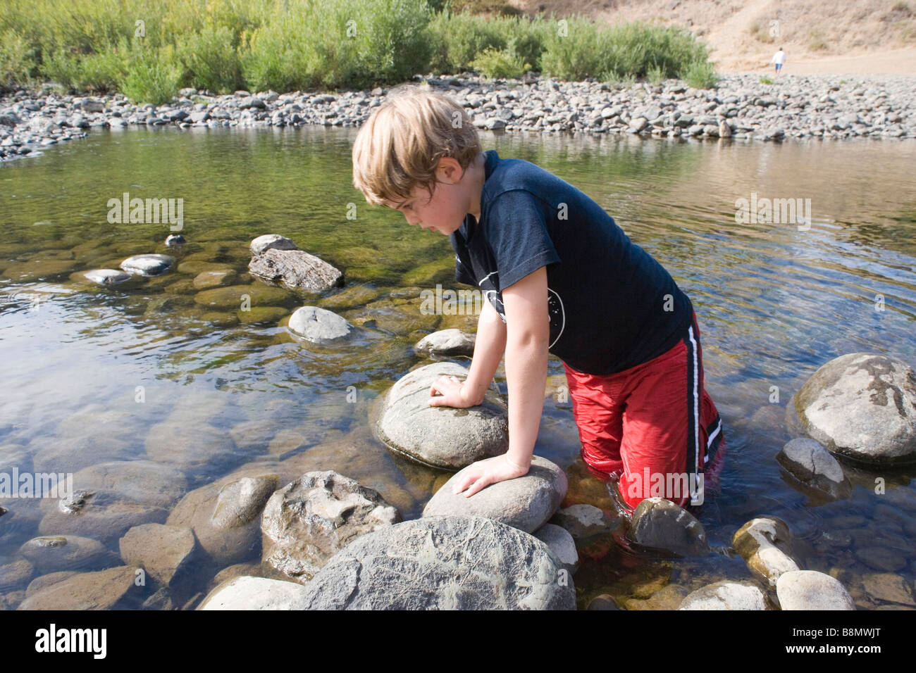 Boy fishing river frog hi-res stock photography and images - Alamy