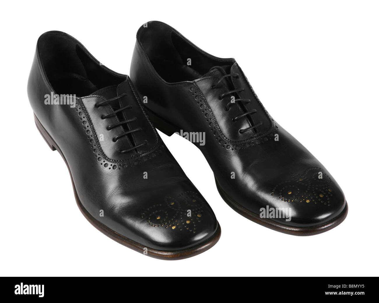 Black men shoes detail on white background Stock Photo - Alamy
