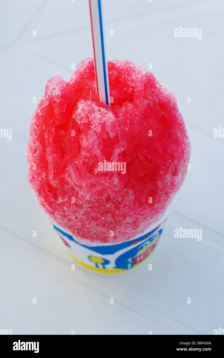 Kakikori, or shaved ice, flavoured with red strawberry syrup, is a