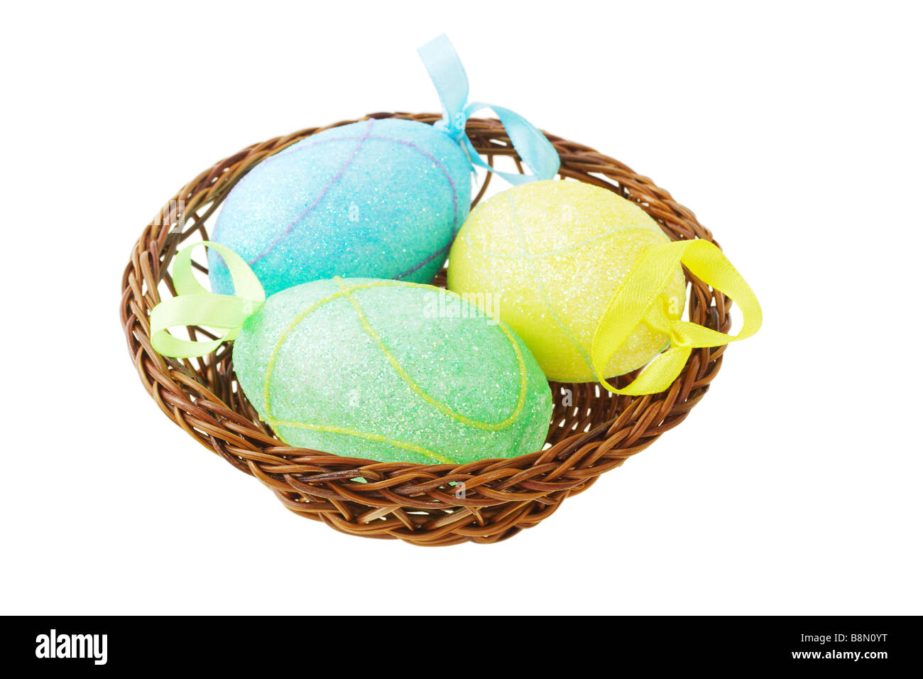 Colorful Easter eggs in basket on white background Stock Photo - Alamy