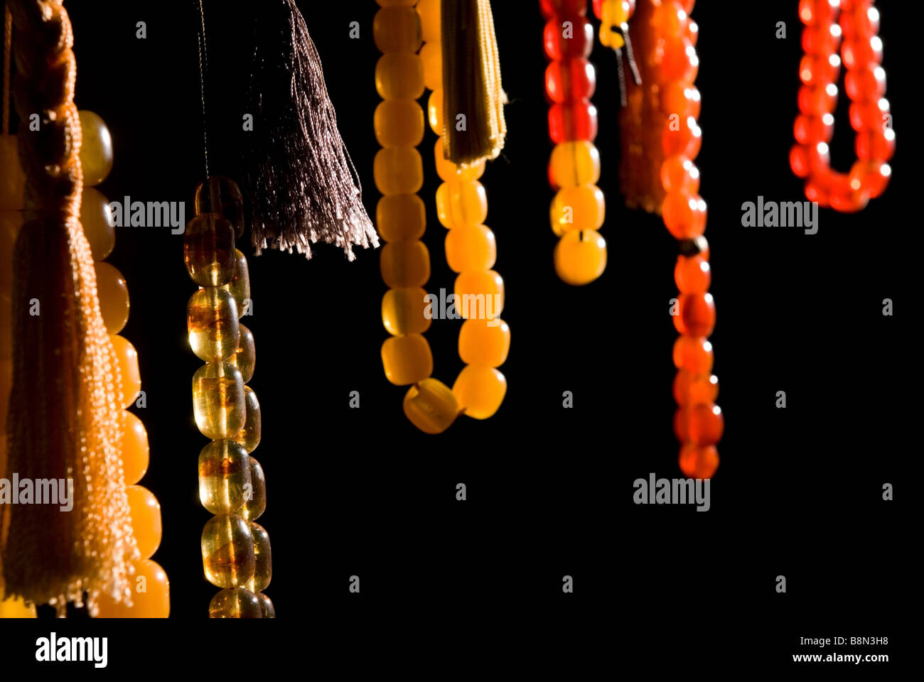 Set of Greek kompoloi or komboloi made of amber. Worry beads resemble prayer bead but without any religious significance Stock Photo