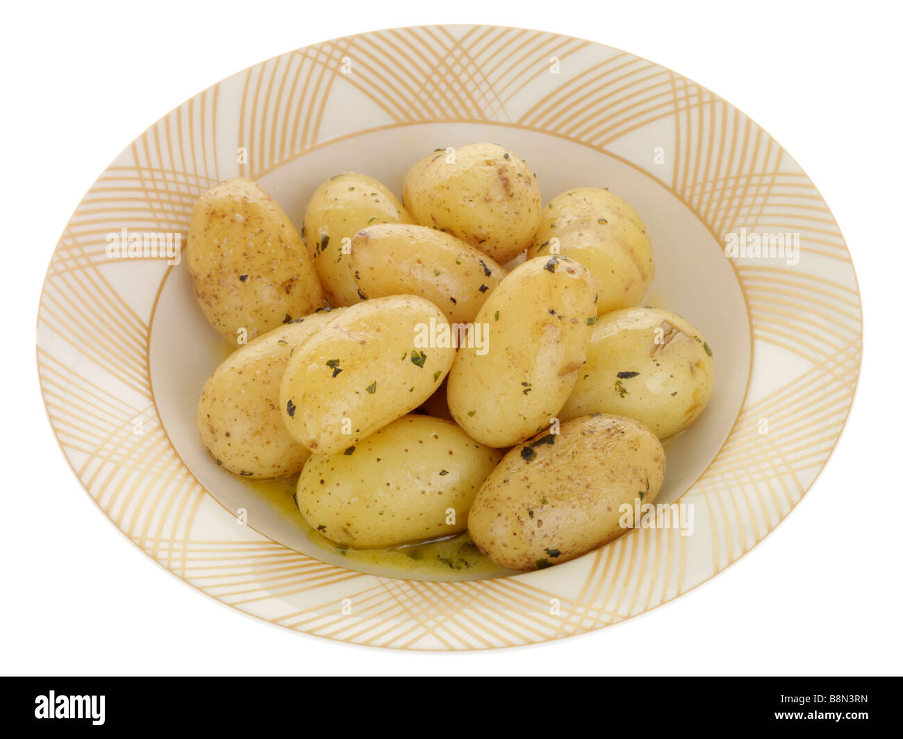 Fresh Boiled New Potatoes With Mint And Butter Isolated Against A White