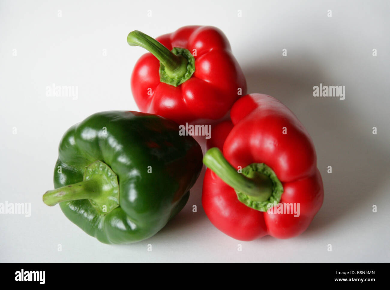 Red and Green Capsicum Peppers Stock Photo