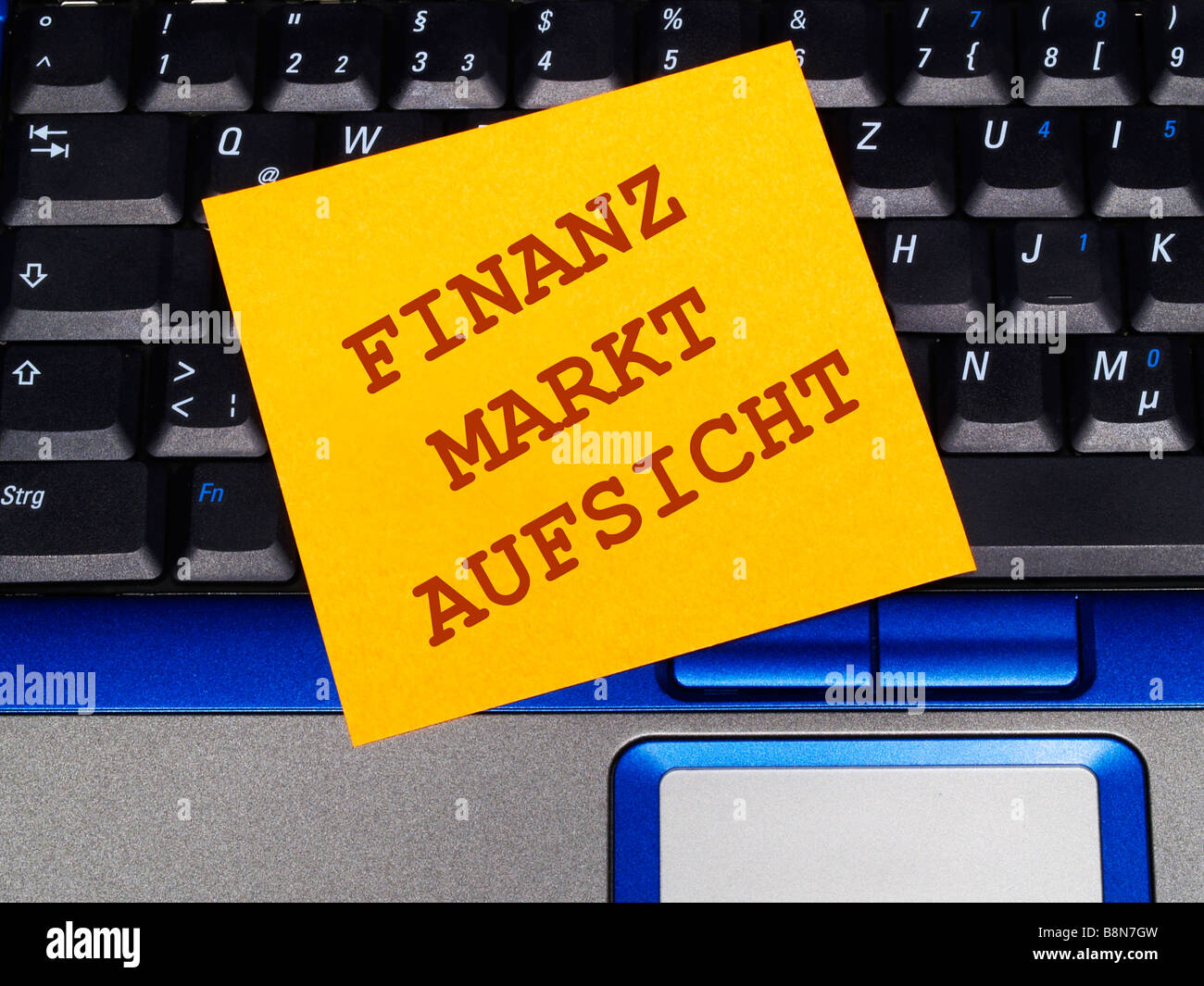 memo note on notebook, financial market controlling Stock Photo