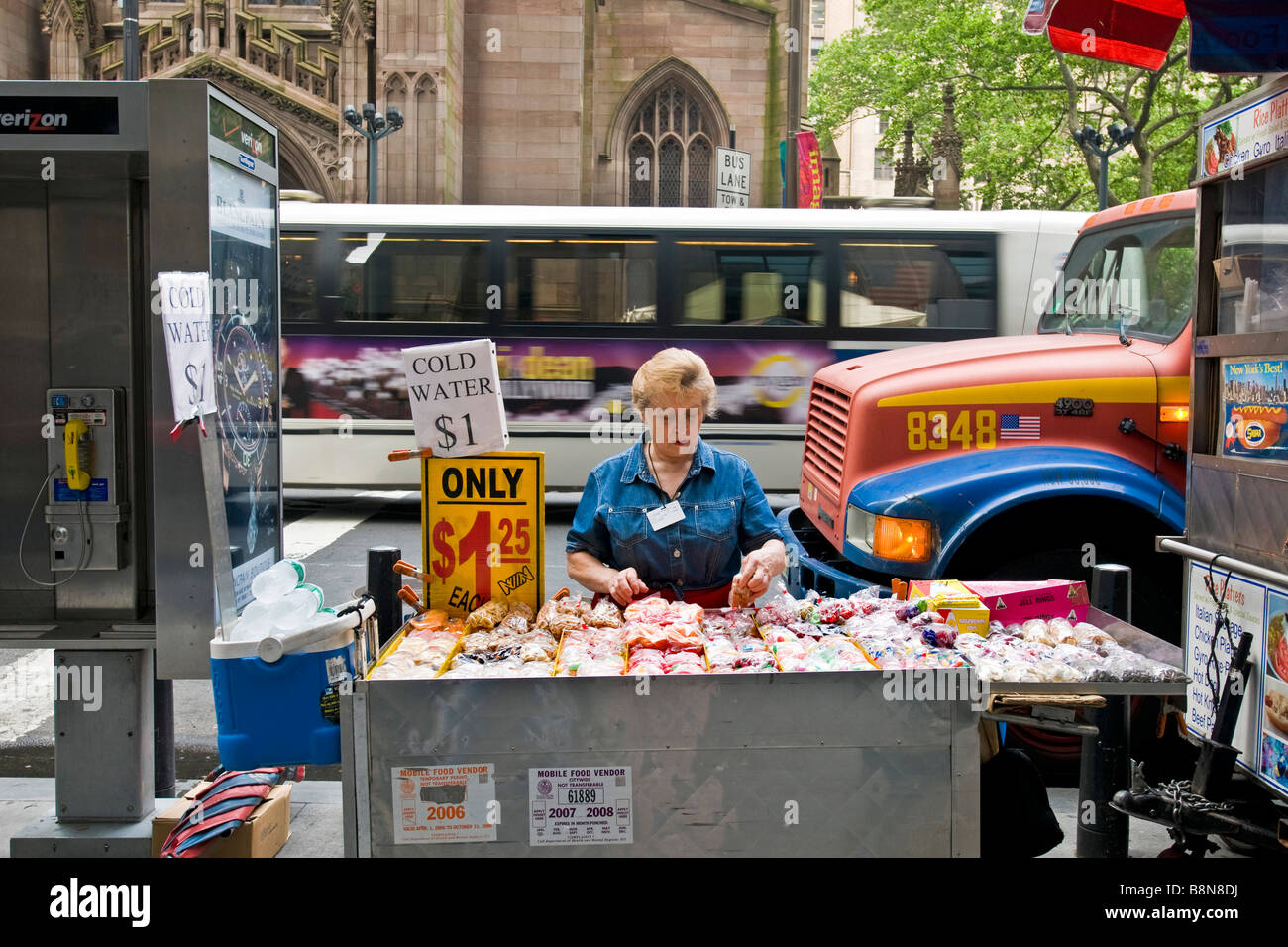 Street scene with stall selling cold water Stock Photo