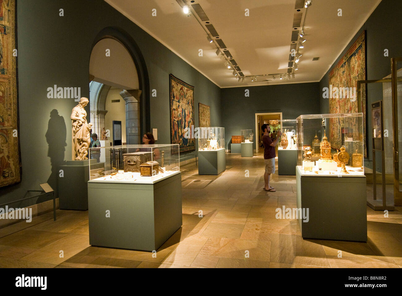 Gallery displaying a collection of tapestries and other items of classical antiquity, Metropolitan Museum of Art Stock Photo