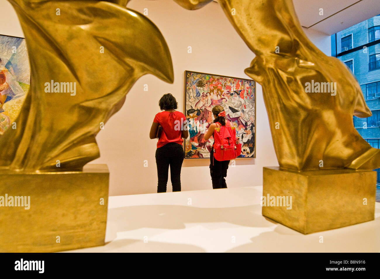 Visitors viewing various artworks, Museum of modern art Stock Photo