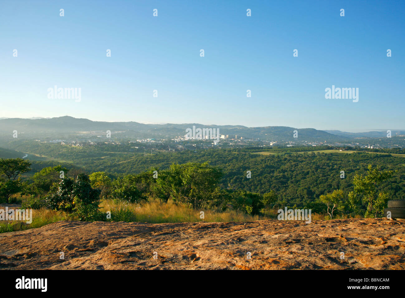 A scenic view of Nelspruit town surrounded by natural bush Stock Photo