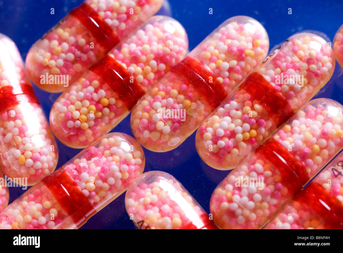 Pharmaceutical drug capsules containing time release cold medicine mini