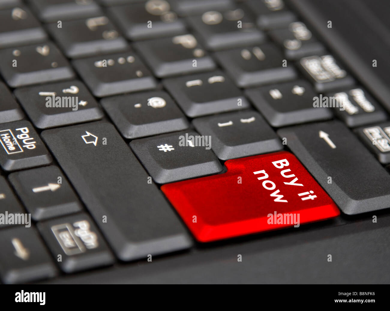 A computer screen with a Buy It Know button Stock Photo