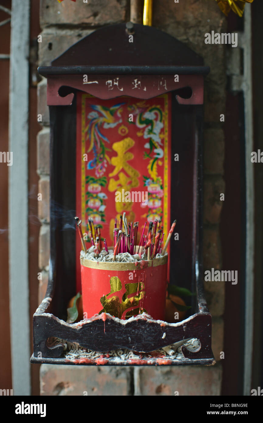 Incense burning outside house Guangzhou China Stock Photo Alamy