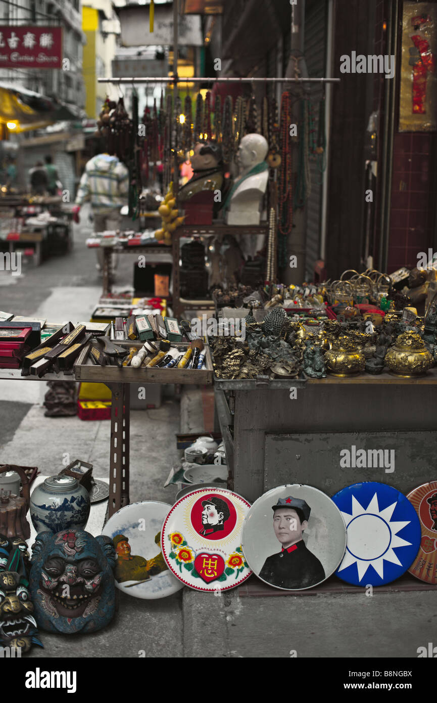 Mao Zedong memorabilia and antiques for sale at stall on Upper Lascar Row Hong Kong Stock Photo