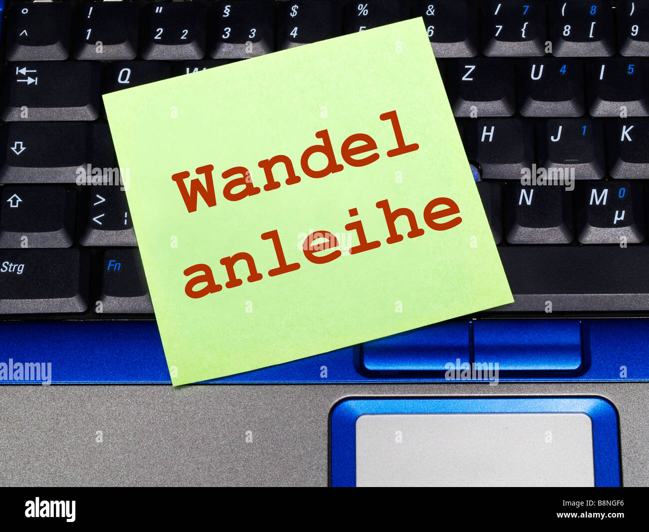 memo note on notebook, conversion issue Stock Photo - Alamy