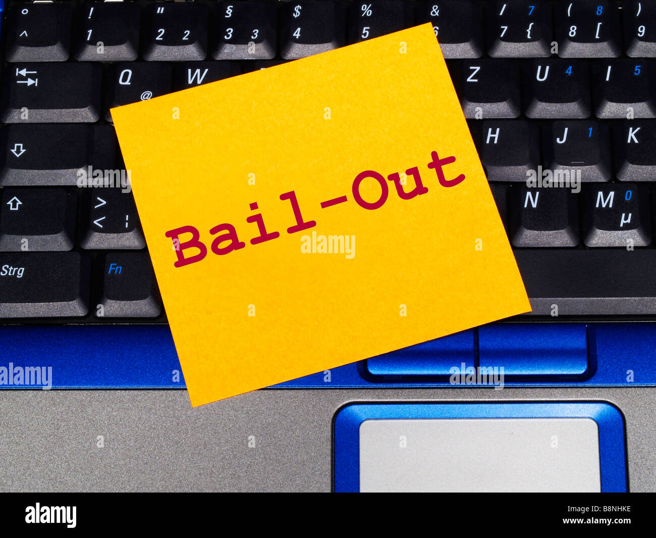 memo note on notebook, Bail-Out Stock Photo