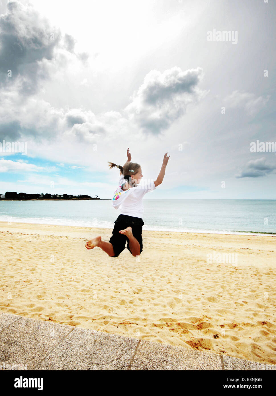 girl leaping Stock Photo