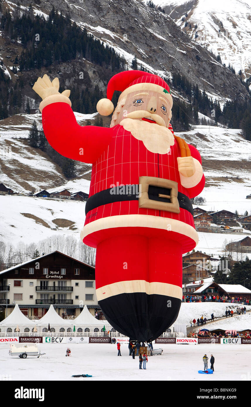 Special shape hot air balloon Colt Santa Claus SS on the launching site, Chateau d Oex, Switzerland Stock Photo