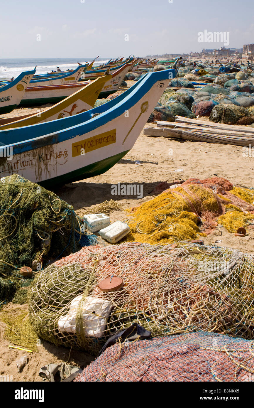 India Tamil Nadu Chennai beach tsunami relief fibreglass fishing boats on shore Stock Photo
