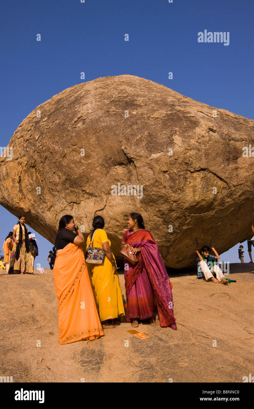 India Tamil Nadu Mamallapuram Krishnas Butter Ball young female tourists from Andhra Pradesh Stock Photo