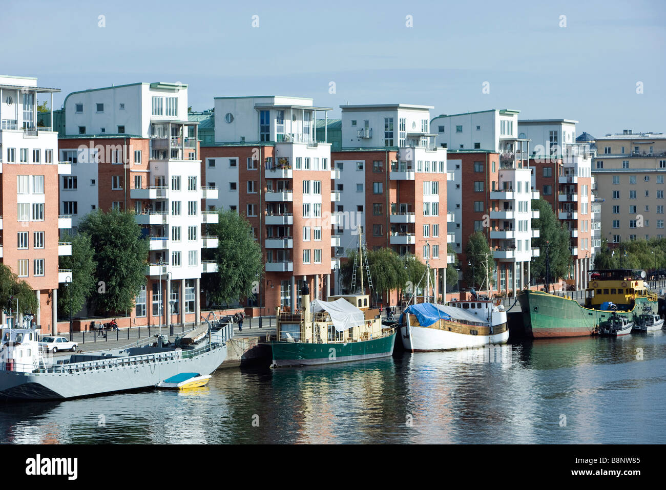 Sweden, Sodermanland, Stockholm, waterfront apartment buildings Stock Photo