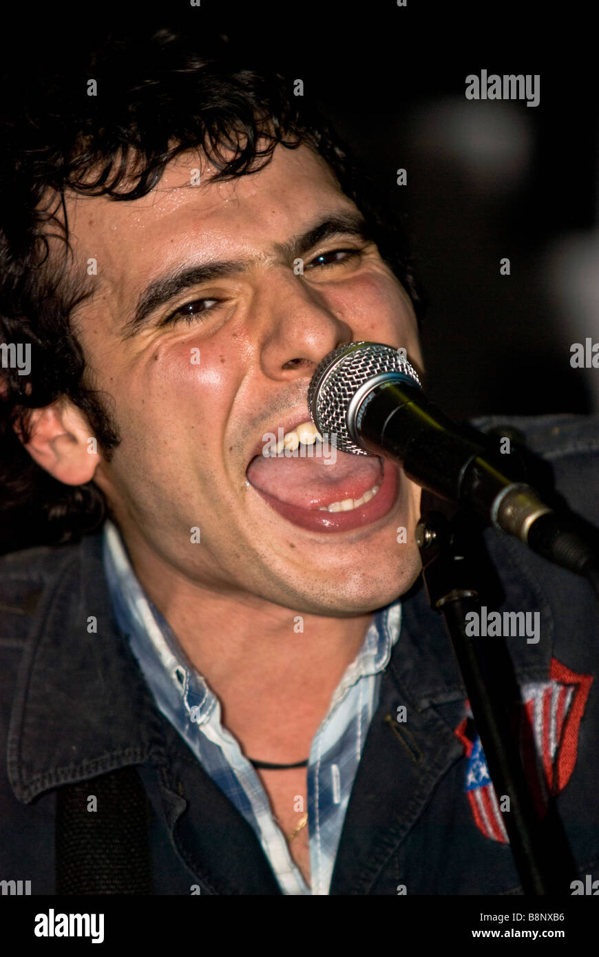 A male singer performs on stage in London, UK Stock Photo Alamy