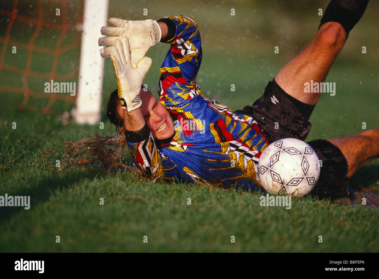 Soccer goalie in action Stock Photo Alamy