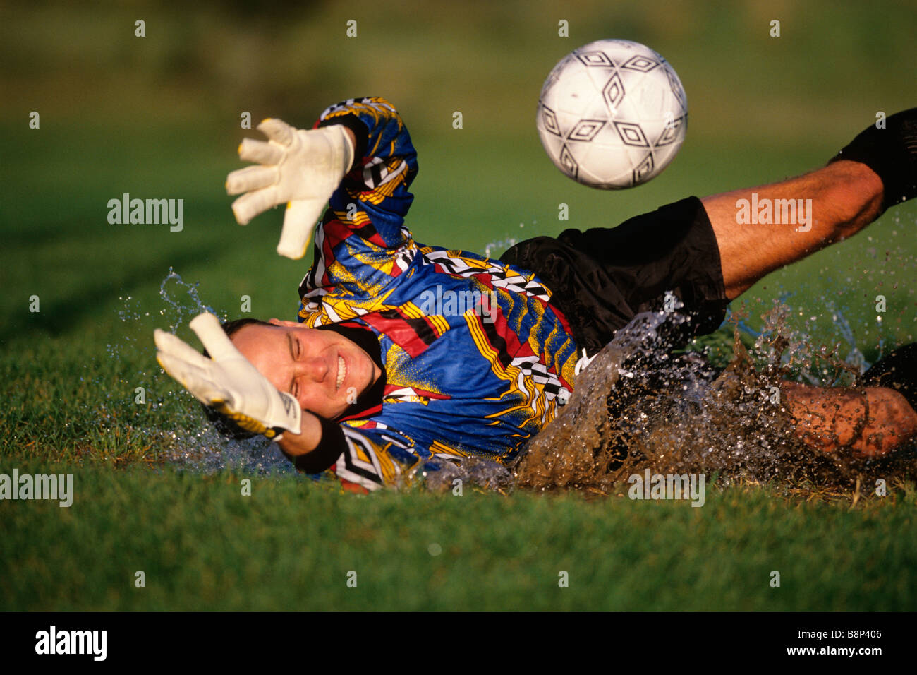 Soccer goalie in action Stock Photo Alamy