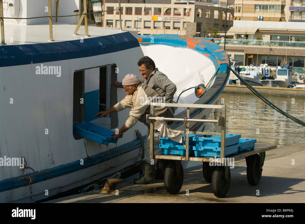 commercial Fishermen Unloading Their Catch From a Fishing Trawler Santa Pola Spain Stock Photo