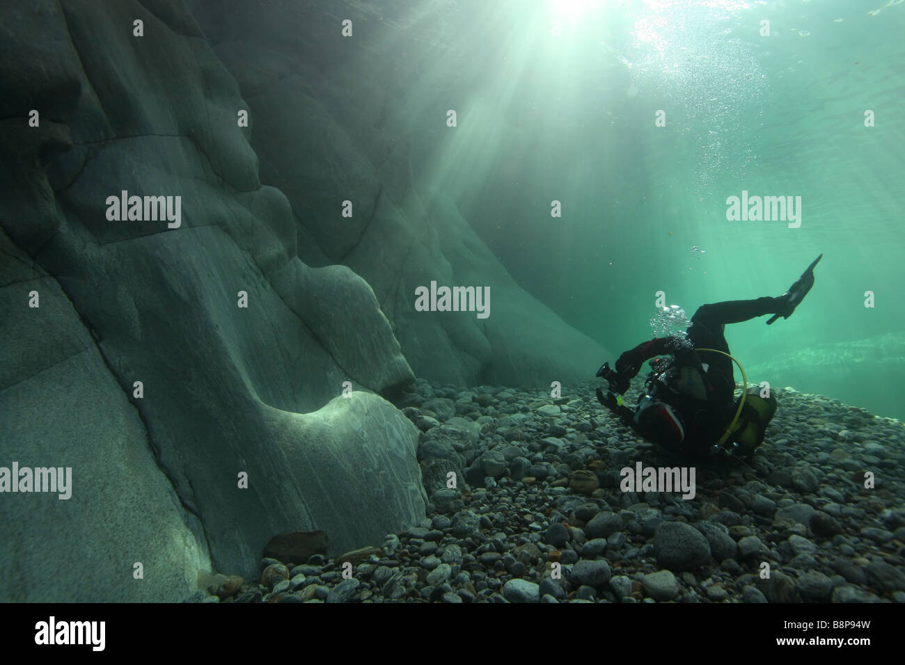 An underwater photographer in a river Stock Photo Alamy