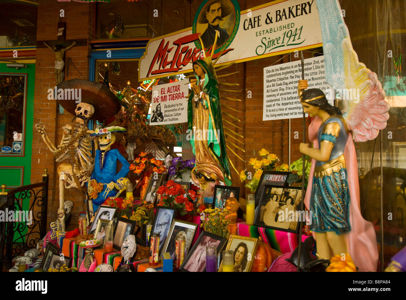 Day of the Dead altar display skulls skeletons large sunflowers Mi Tierra cafe bakery San Antonio Texas tx Stock Photo