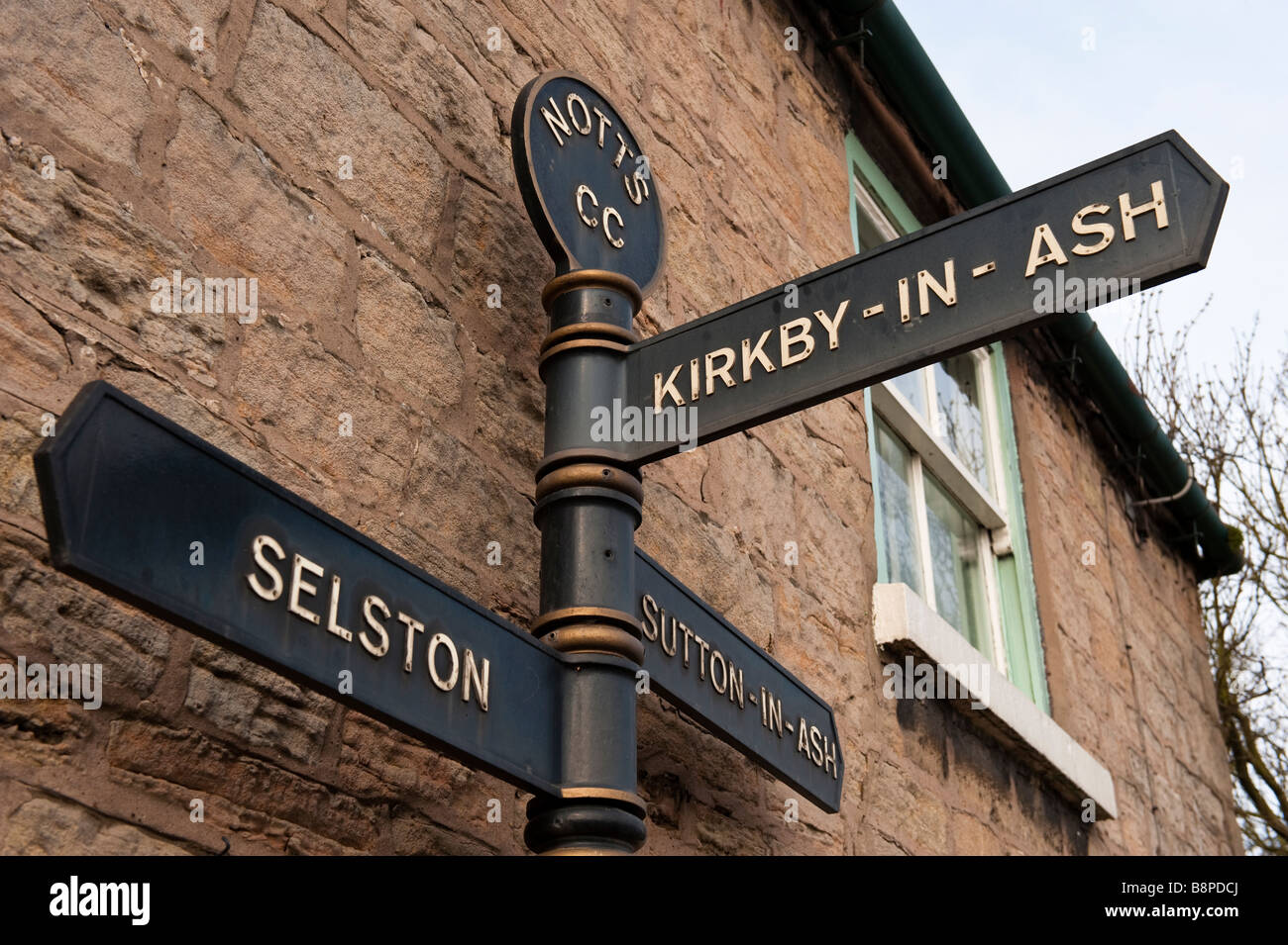 Direction village sign at Kirkby Cross, situated in Kirkby In Ashfield ...