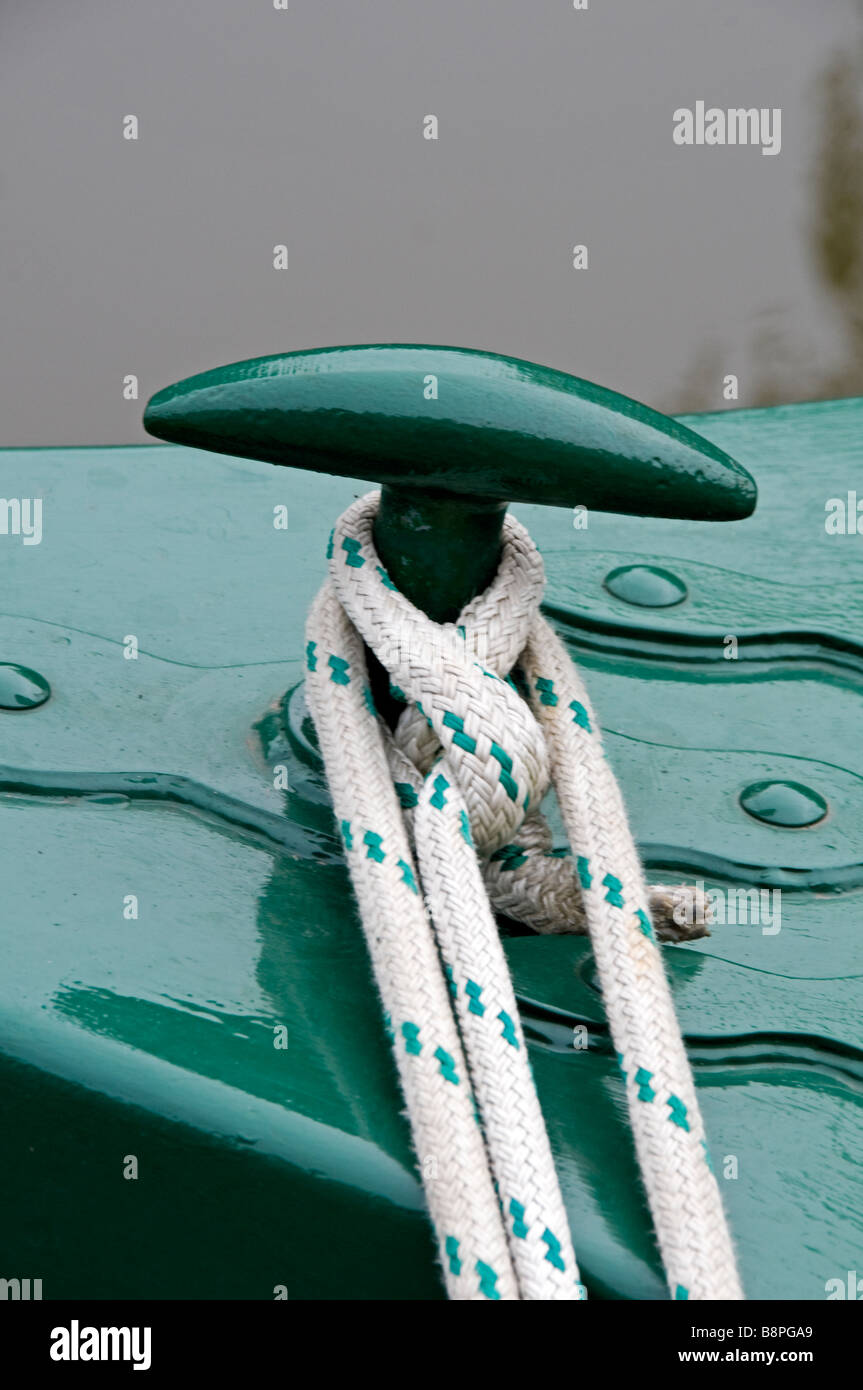 Closeup of cleat and line on the bow of a narrowboat Stock Photo Alamy