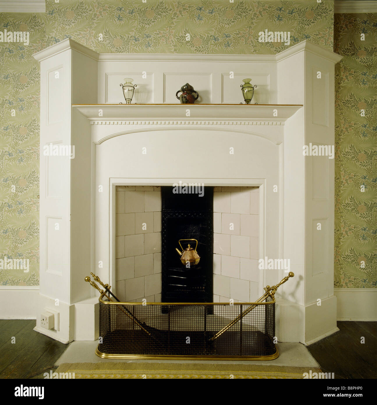 Kettle trestle in fireplace with copper kettle in the Larkspur Dressing