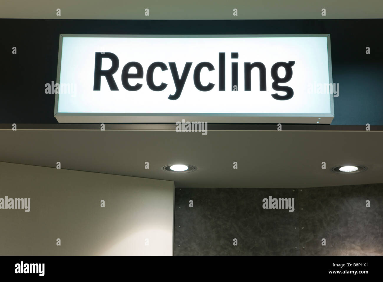 Illuminated 'recycling' sign Stock Photo