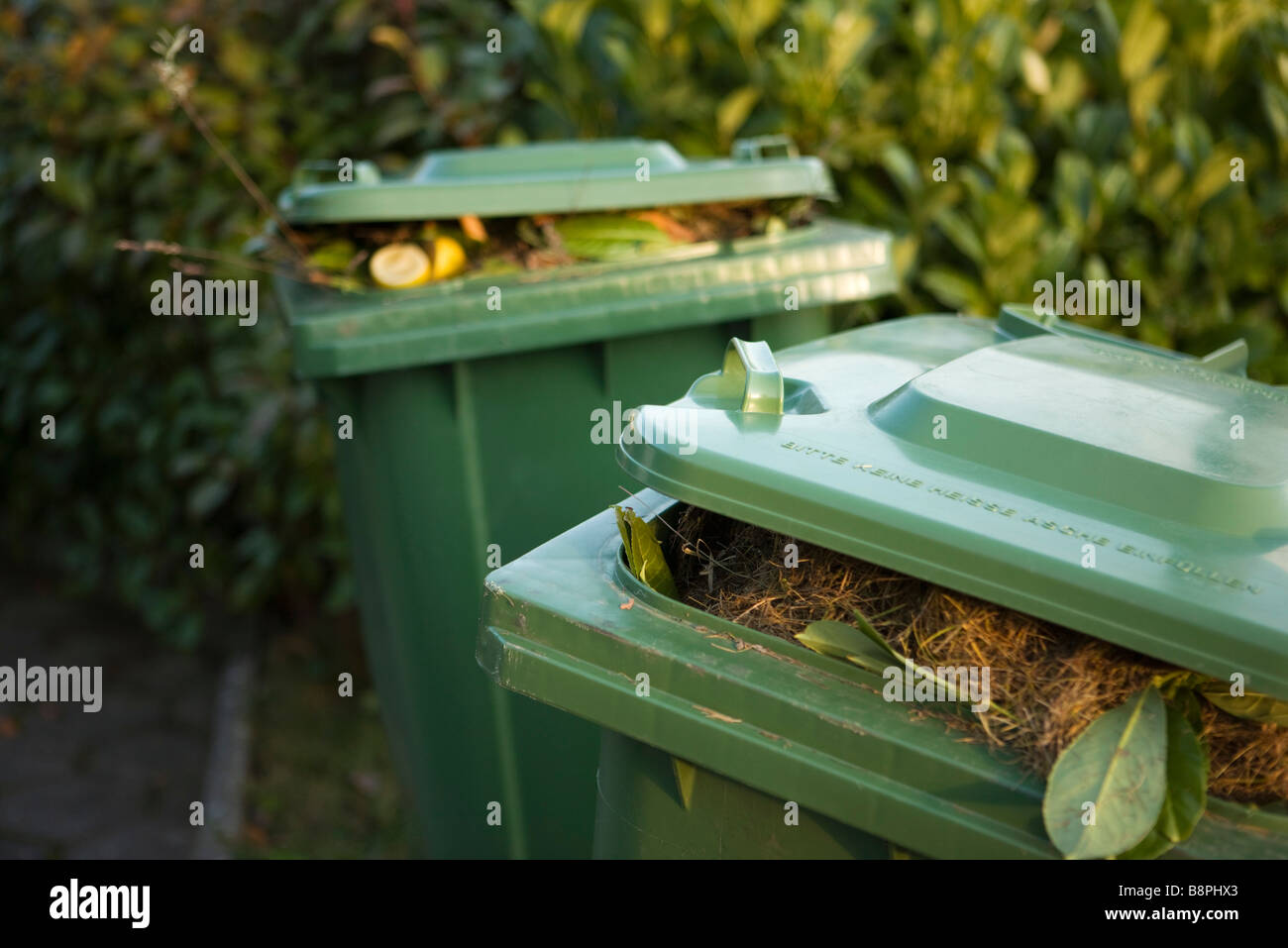 Garbage cans filled with compost Stock Photo Alamy