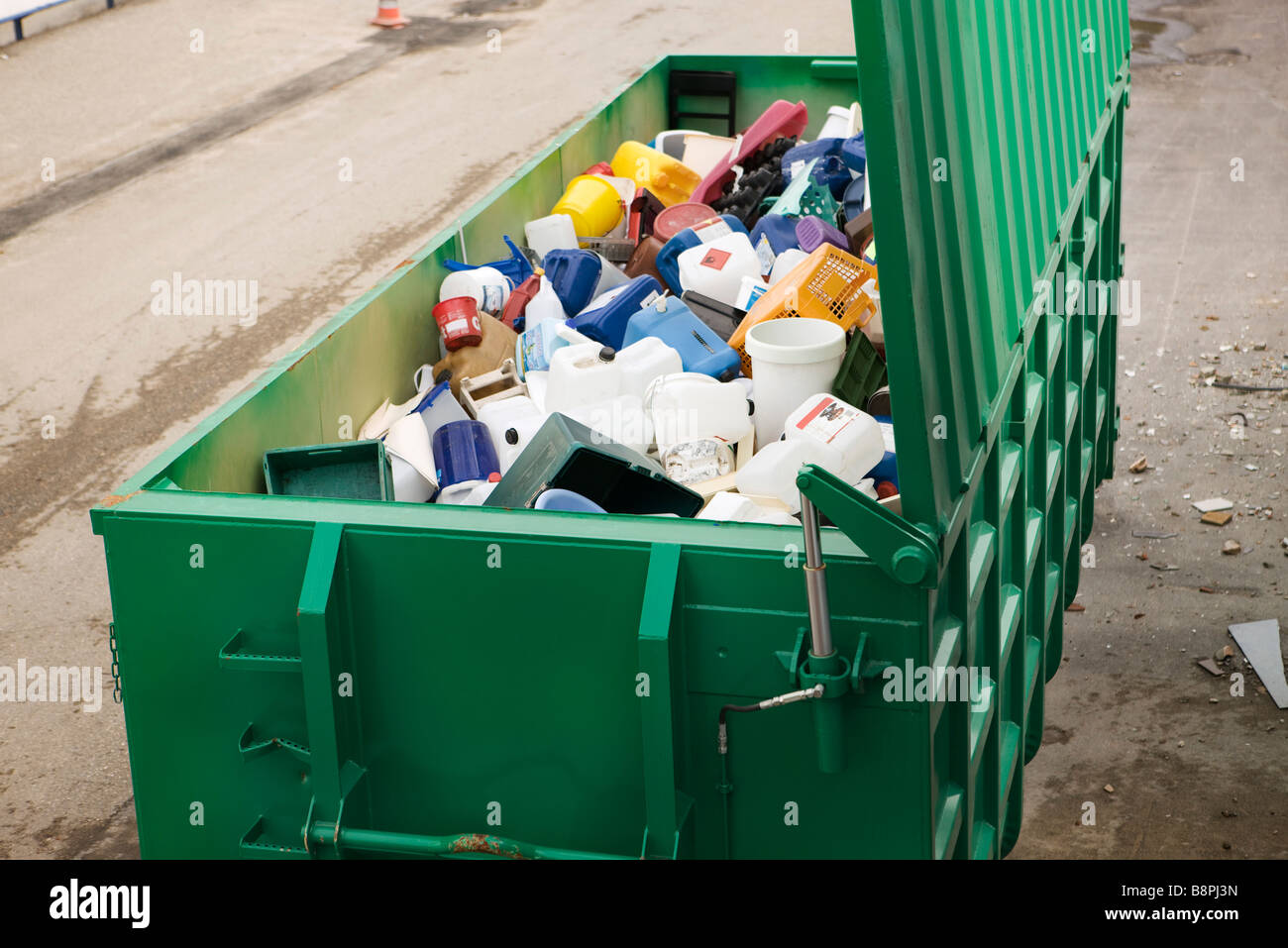 Large recycling bin full of discarded plastic containers Stock Photo