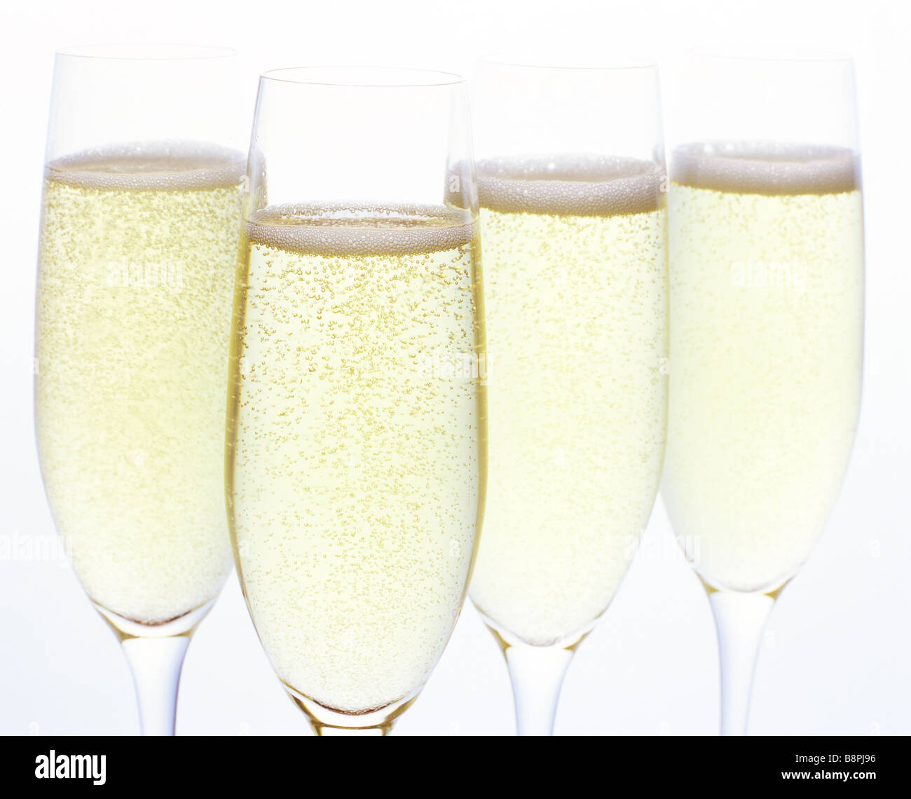 Four Champagnes Glasses with white background Stock Photo Alamy