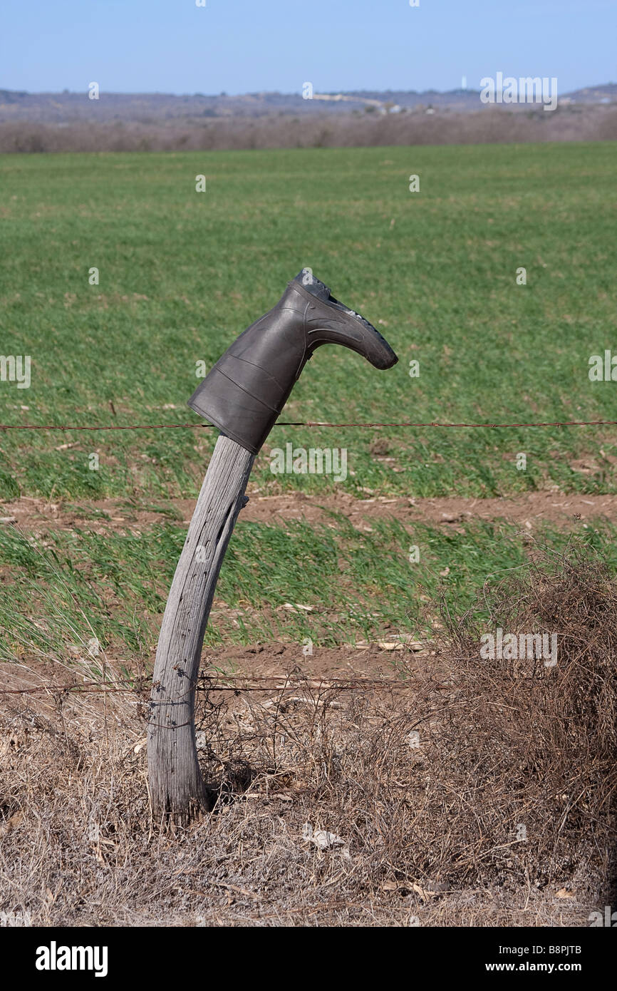 Boot on a fence post Stock Photo Alamy