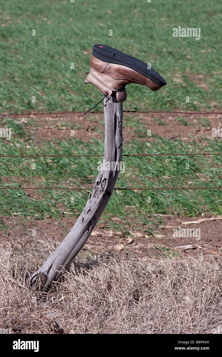 Boot on fence post Stock Photo Alamy