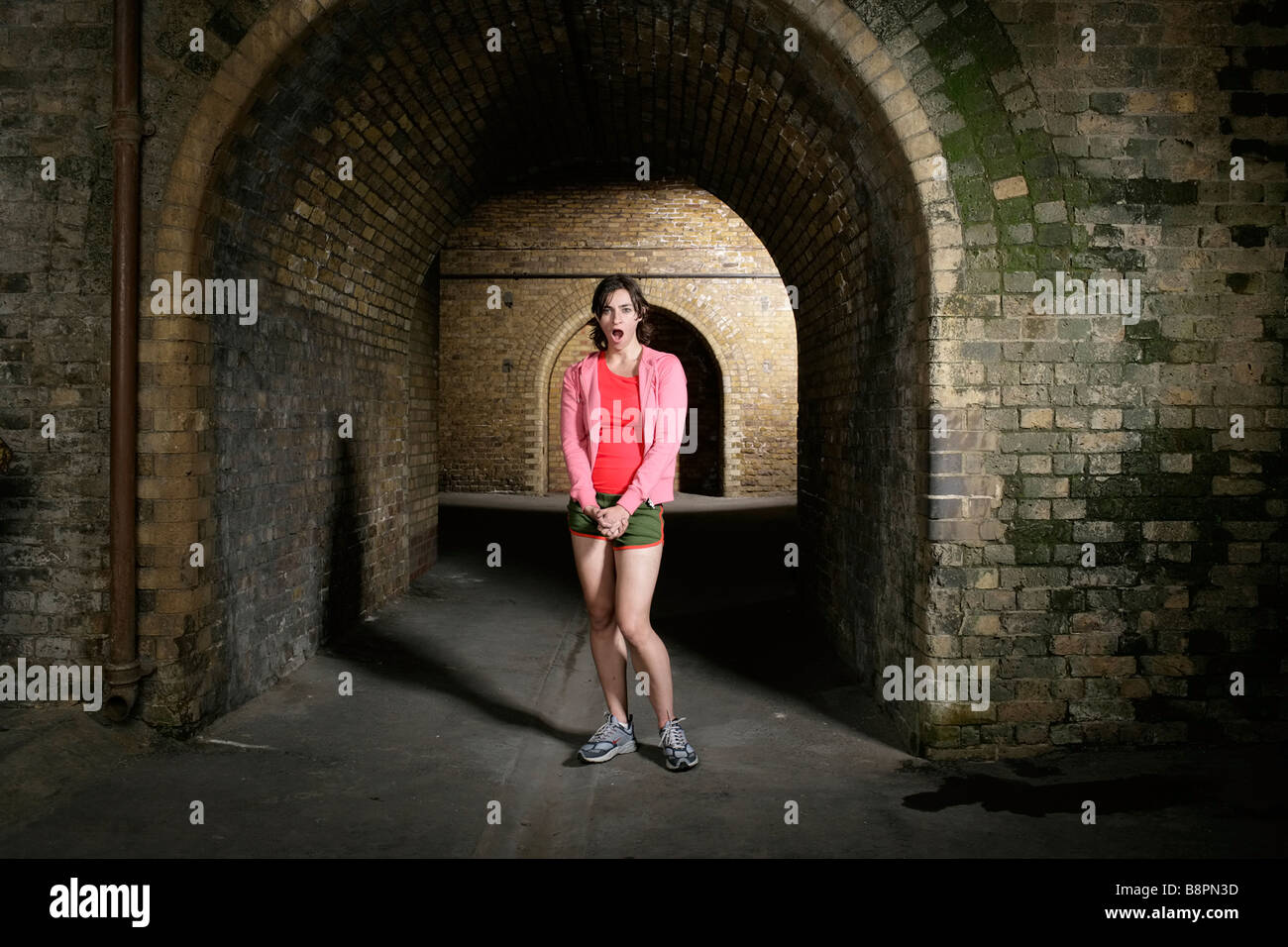 Lady girl yawning after a workout hires stock photography and images