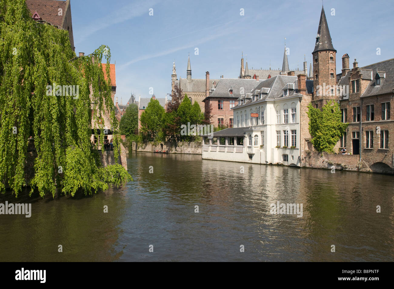 Buildings by canal Bruges Belgium Stock Photo