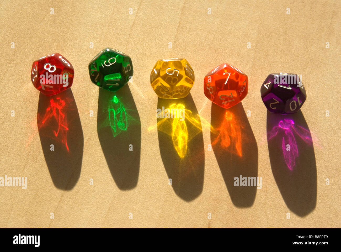 multi colored twelve sided dice Stock Photo