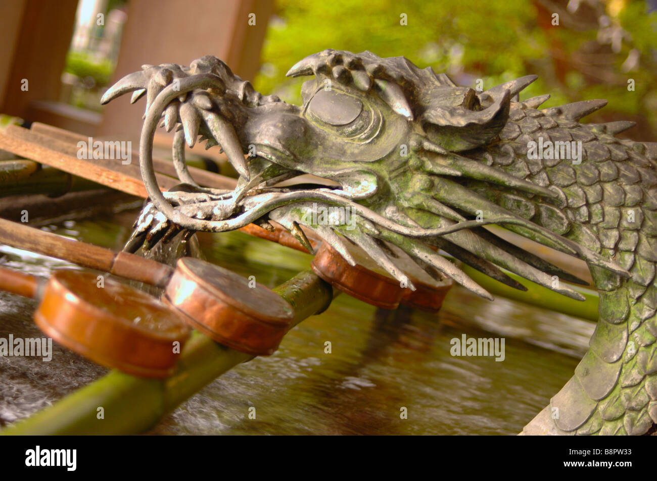 A Dragon water fountain at Shinto temple Japan Stock Photo Alamy