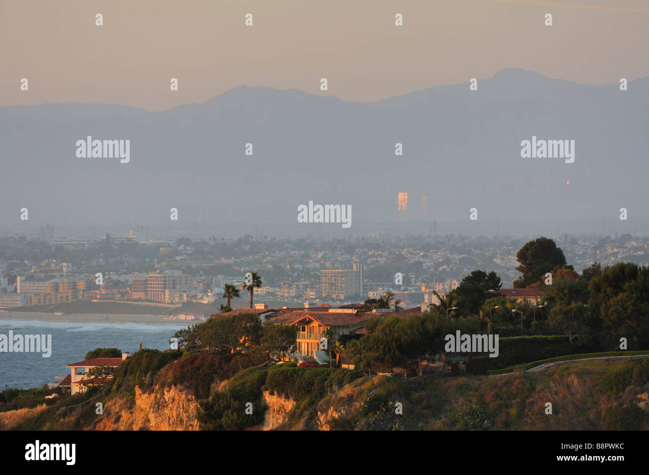 Sunset at Rancho Palos Verdes Estates with hazy greater LA as backdrop