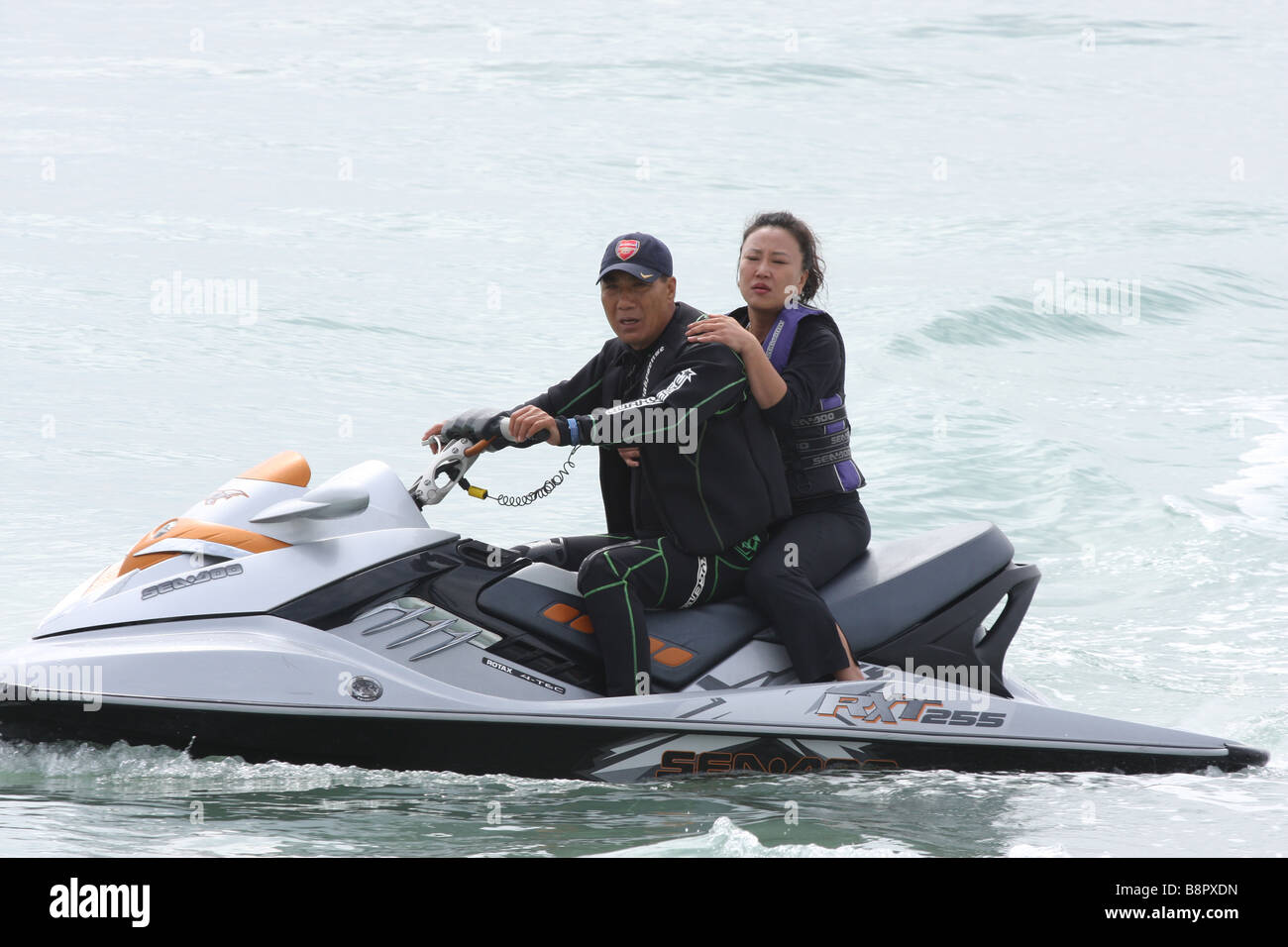 Couple on jet ski in Busan (Pusan) in South Korea Stock Photo Alamy