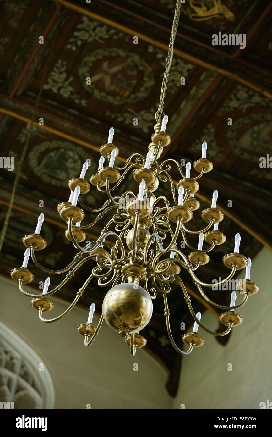 Chandeliers in the ante chapel at Trinity college Stock Photo