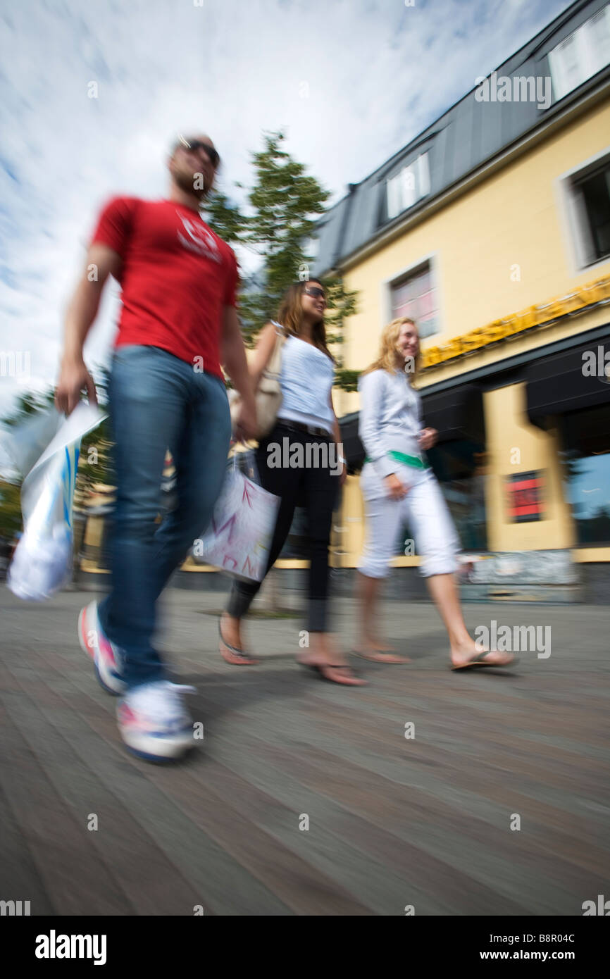 Young people on a shoppingstreet. Stock Photo