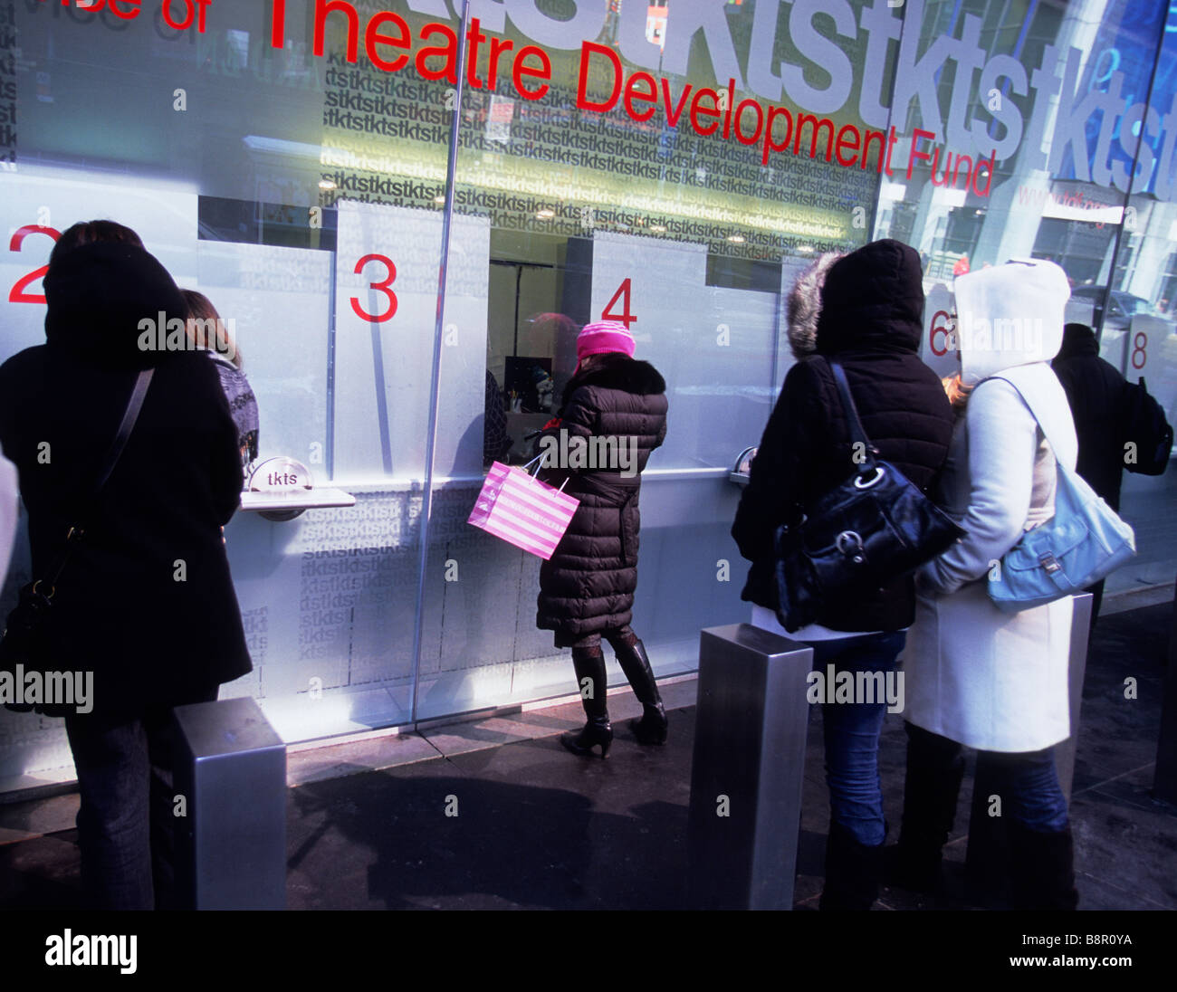 TKTS Theatre ticket booth New York City Broadway and Times Square. Duffy Square. People buying discount theater tickets. Entertainment box office USA Stock Photo