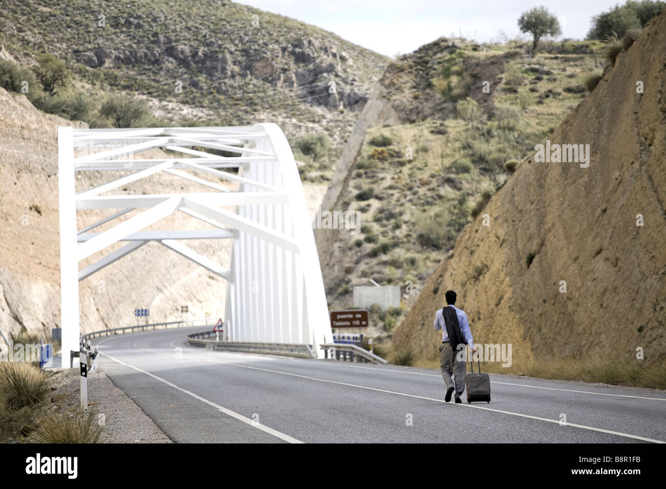 Man walks alone along deserted hi-res stock photography and images - Alamy