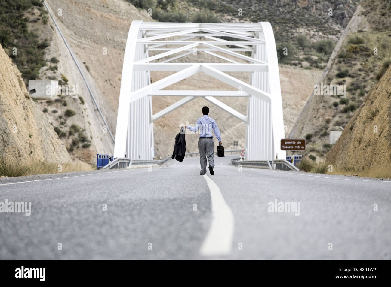 Man walks alone along deserted hi-res stock photography and images - Alamy